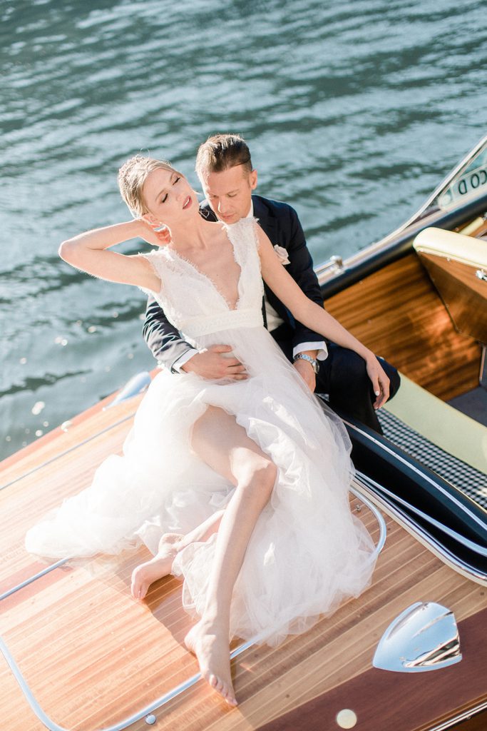 Newlyweds on boat lake como